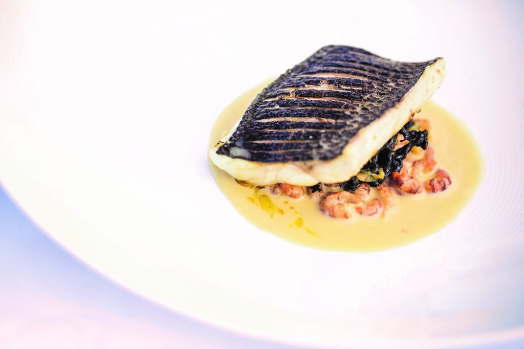 Sea bass, champagne and shrimp sauce, made by Galton Blackiston